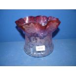 A Cranberry fluted glass light shade for an oil lamp, 7'' high x 8 1/4'' diameter.