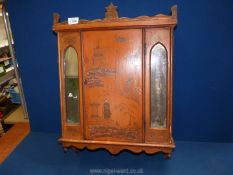 A chinoiserie decorated smoker's Cabinet with two mirror panels to front and one interior drawer,