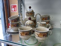 A German Studio style coffee service to include milk jug, 6 cups, 6 saucers,