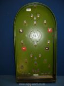 A vintage Bagatelle board (with spring loader), 29 1/2'' high x 15 1/4'' wide.