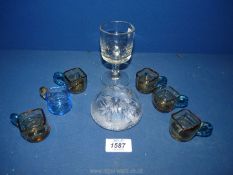 A small quantity of glass including a crystal glass paperweight with flower,