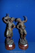 A pair of spelter bronzed figures by H.