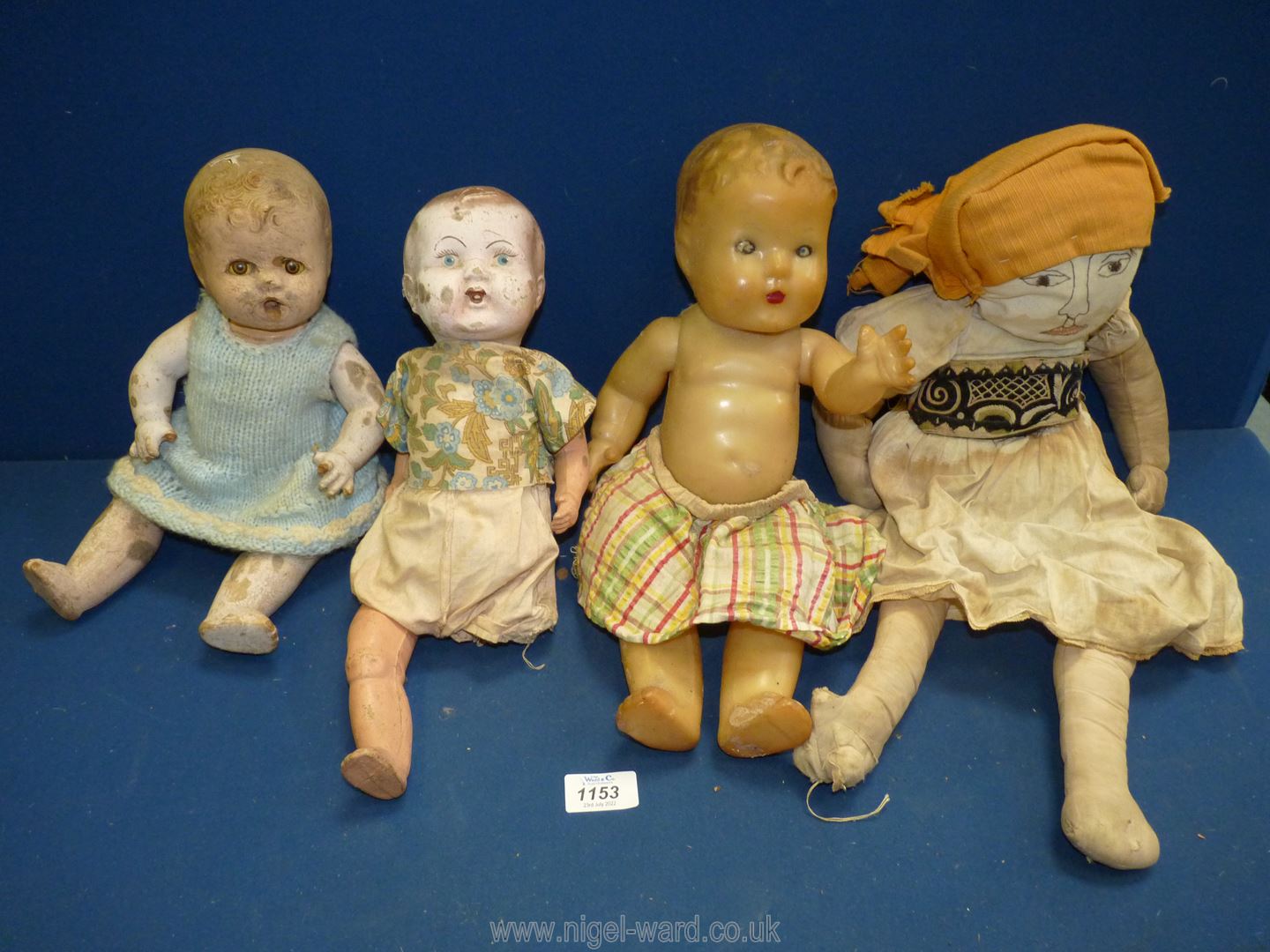 Four old dolls, one being rag doll, all a/f.
