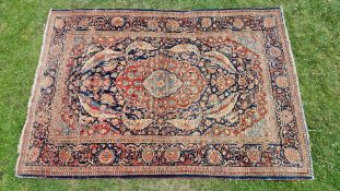 A natural dyed blue ground mashad pattern Persian carpet a/f., approx. 53 1/2" x 75 1/4".