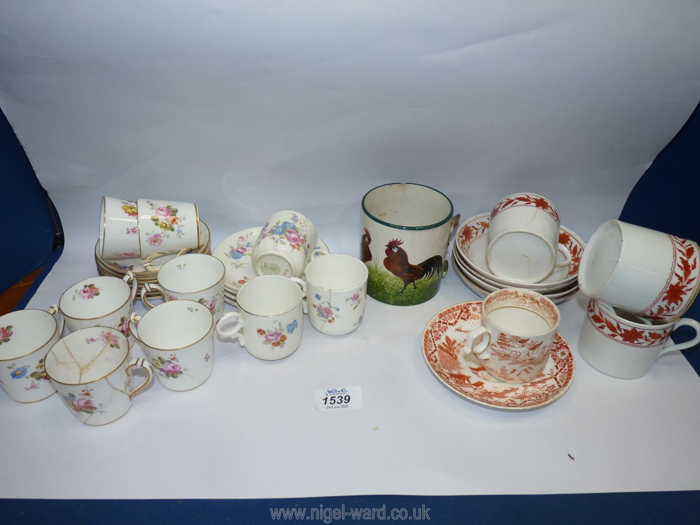 A quantity of small cups and saucers including Crown Derby and Hammersley,