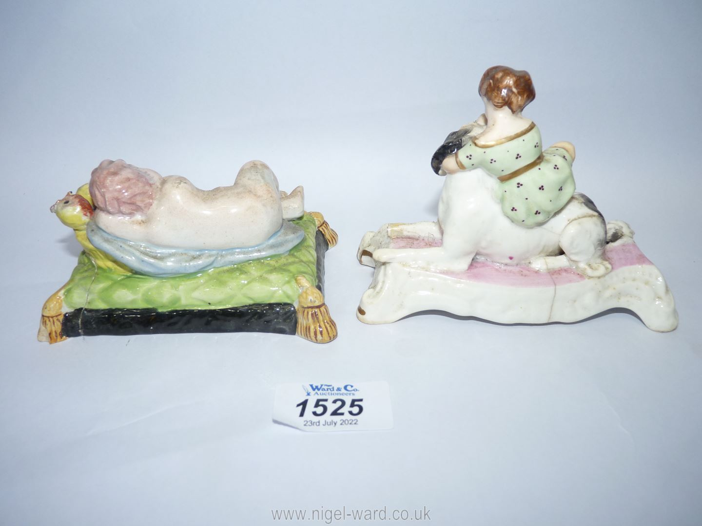 A Staffordshire porcelain figure of sleeping Putti on a green tasseled cushion, - Image 3 of 4