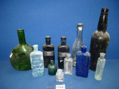A quantity of old bottles including two Robertson's manuscript ink bottles (full),