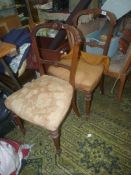 A pair of circa 1900 side Chairs having turned and fluted front legs.