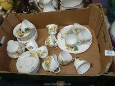 A Czecho-slovakian china part Teaset with yellow roses and violets and a Royal Imperial Teaset with