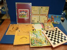 A quantity of board games including Draughts, Snakes & Ladders, Play the Game Book,
