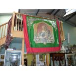 A large red and green Banner depicting Queen Victoria with 'Loyal Victoria Lodge, No. 029 L.O.A.S.A.