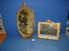 A framed and gilded square table mirror and an oval wall mirror.