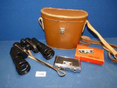 A cased set of Dollond 9 x 40 binoculars and a small boxed set of 2.5 x 25mm pocket binoculars.
