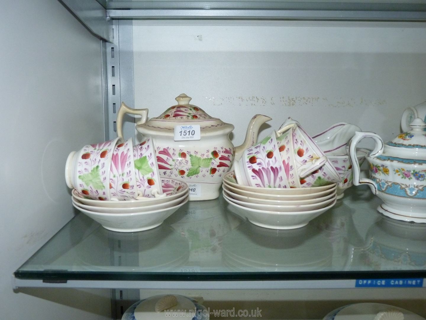 A Gaudy 'Welsh' style painted pink, orange and green part tea set including teapot, 8 saucers,