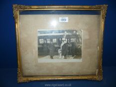 A framed black and white Photograph of Edward VII boarding a train, 15" x 13".