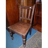 An Edwardian Mahogany solid seated side Chair having turned front legs,