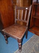 An Edwardian Mahogany solid seated side Chair having turned front legs,