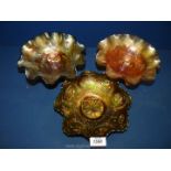 Three Carnival Glass dishes.