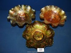 Three Carnival Glass dishes.