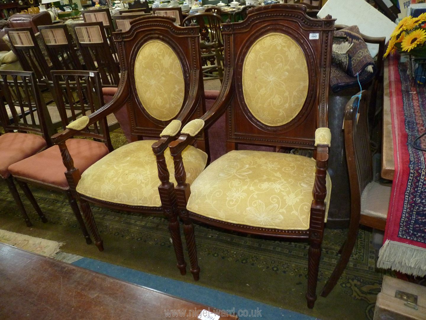 A pair of Mahogany framed open armed Hall Armchairs having bead details to the arms and top rail,