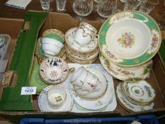 A quantity of part china teasets including Minton and Coalport, Alfred Meakin plates, Aynsley etc.