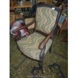 A darkwood framed open armed Elbow Chair having scroll terminating arms,