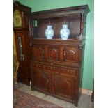 An unusual 18th century peg-joyned Oak Triadarn, the base with three frieze drawers,
