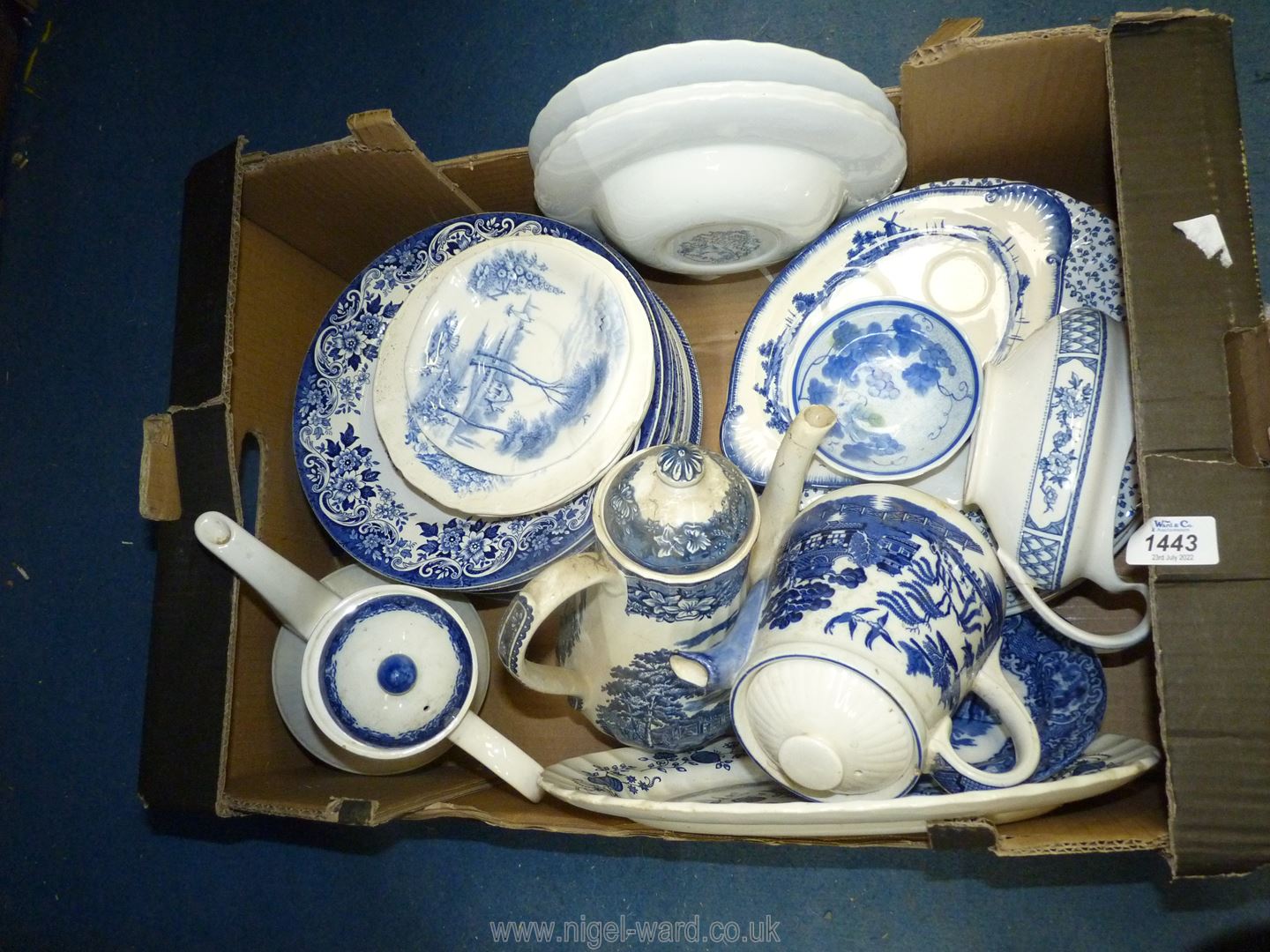A quantity of blue and white china including Meakin bowls, Royal Doulton old Willow teapot,