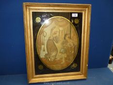 An embroidery in large gilt frame with black and gold painted on the glass around the oval