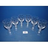 Six old wine glasses with cut stems giving the illusion of spirals, etched stars to cup of goblet.
