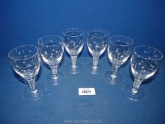 Six old wine glasses with cut stems giving the illusion of spirals, etched stars to cup of goblet.