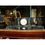 A black and green slate Clock and garniture set.