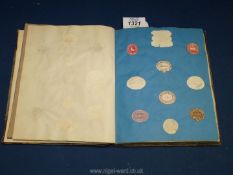 A book of containing a quantity of monograms, dies and crests of families and firms in U.K., etc.