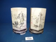 A pair of oriental hexagonal shaped marble brush pots, (some chips), 5 1/2'' high.