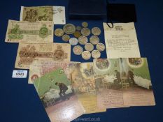 A set of four Postcards and four monetary notes,