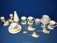 A quantity of china including a 'Pontrilas Coffee Room' trio, small mantle Spaniels,