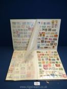 Two stamp stock books containing stamps from Australia, New Zealand, Kenya, US air mail etc.