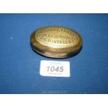An oval brass tobacco/snuff box engraved 'William Parry, Euias Harold, Nr. Pontrilas',