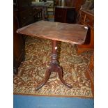 A rectangular topped 19th century occasional table / wine table having a turned support and three