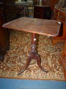 A rectangular topped 19th century occasional table / wine table having a turned support and three