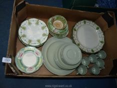 A quantity of Spode coffee cans and saucers, plates and a large plate in Flemish green,