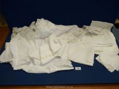 A small quantity of linen including damask, broderie anglaise, lace edge coasters etc.