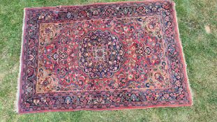 A natural dyed blue ground mashad pattern Persian carpet, a/f., approx. 51 1/2" x 79".