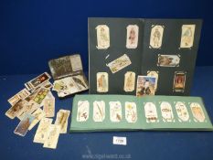 A leather album of Wills cigarette cards, plus an album of John Player & Wills cigarette cards,