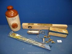 A quantity of miscellanea to include a stoneware hot water bottle, gun cleaning kit,