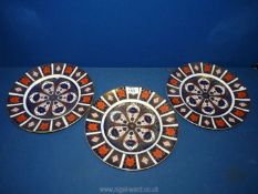 Three Royal Crown Derby Imari Plates (pattern 1128 XXXIX) approx. 10 1/2" diameter.