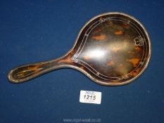 An elegant Walker & Hall Birmingham 1925 silver and tortoiseshell hand mirror,