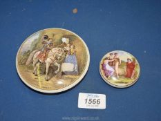 Two framed Ptrattware Pot Lids, one being 'Cavalier' 4 1/4'',