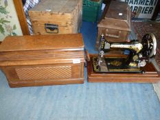 A Singer sewing machine in wooden case, serial no.