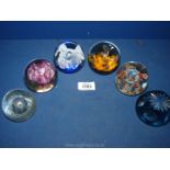 Six paperweights including Strathearn pink floral,blue and white bubble, orange etc.